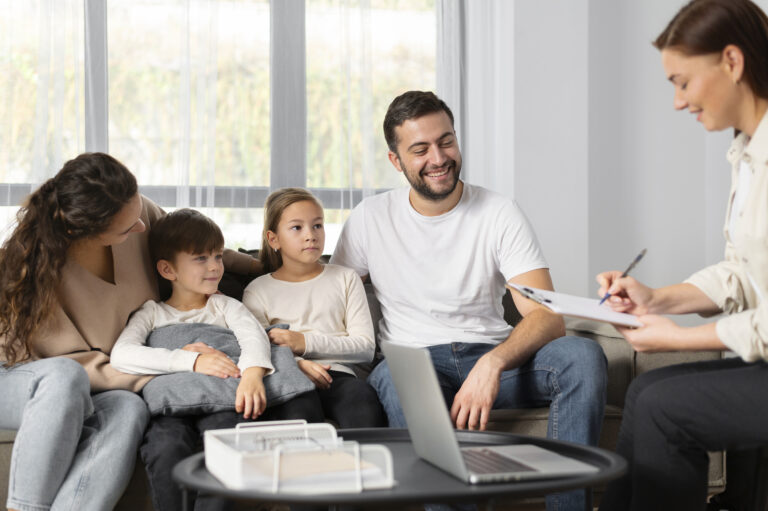 close-up-family-talking-therapist